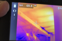 Water leaking into lower room from store front pan | WIS Infrared Pros