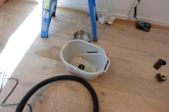 Catching water after test from store front pan | WIS