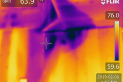 Water intrusion visible on ceiling and wall