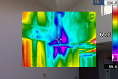 Water intrusion visible on ceiling and wall